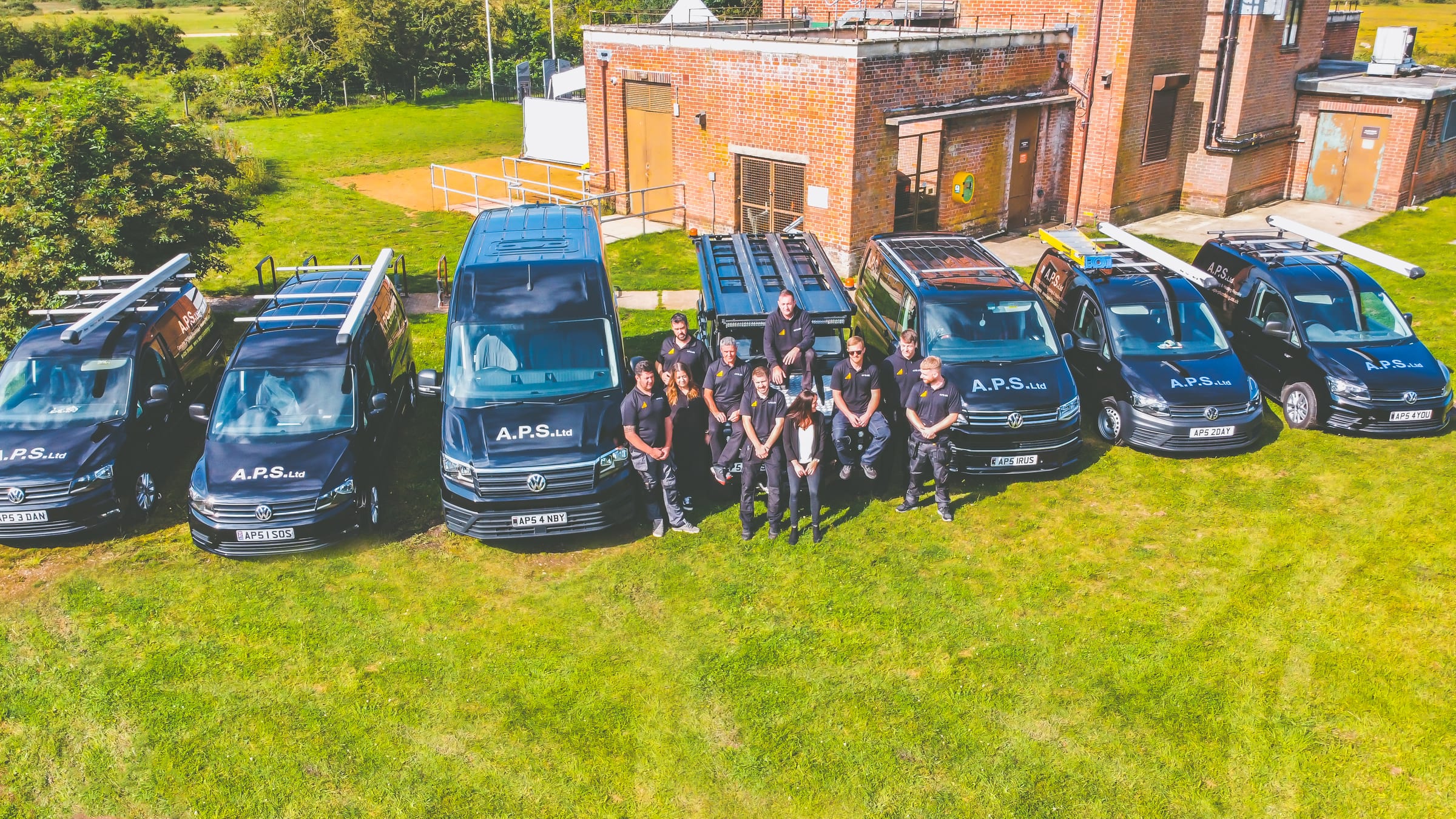 Aerial view of the APS Plumbing team and service vehicles across Berkshire
